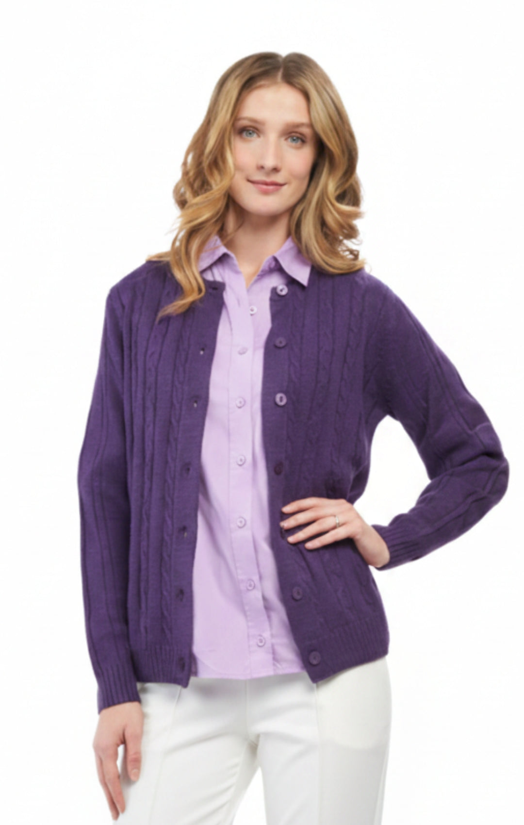 Woman wearing a purple cardigan over a light purple shirt on a white background