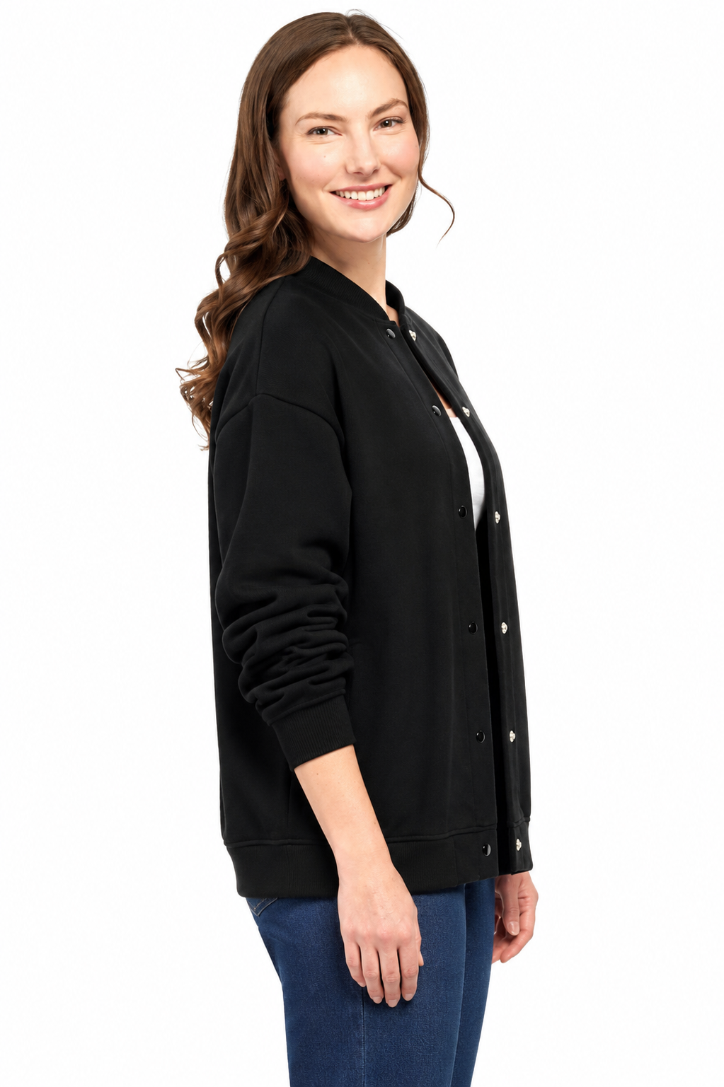 Woman wearing a black jacket with white buttons on a white background