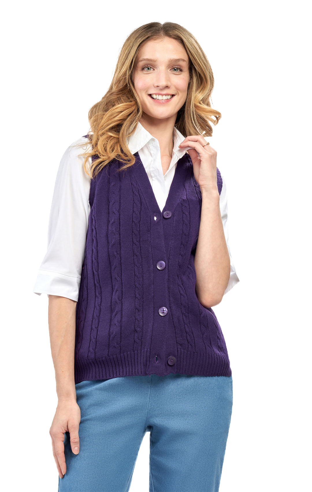 Woman wearing a purple cardigan over a white shirt on a white background
